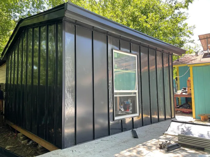 Black standing seam metal wall panels for Metal Roof Installation in East Rancho Dominguez