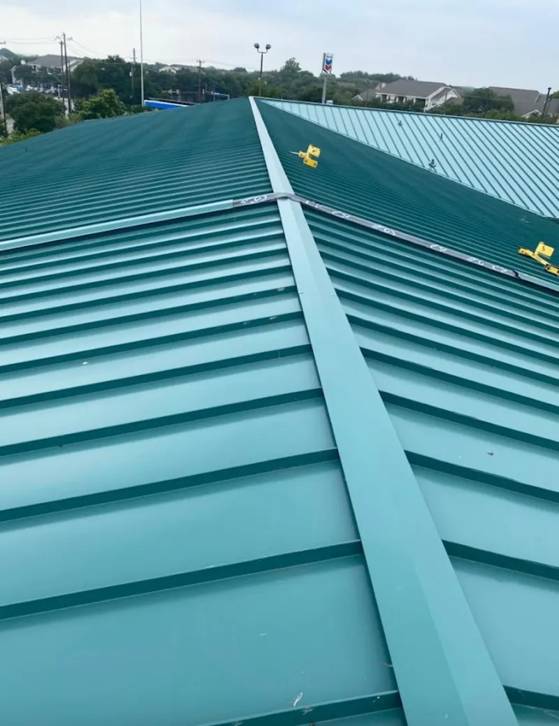 Green commercial metal roof ridge and valley for Metal Roof Repair in East Rancho Dominguez